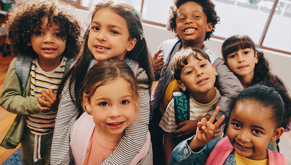 Children in a group smiling